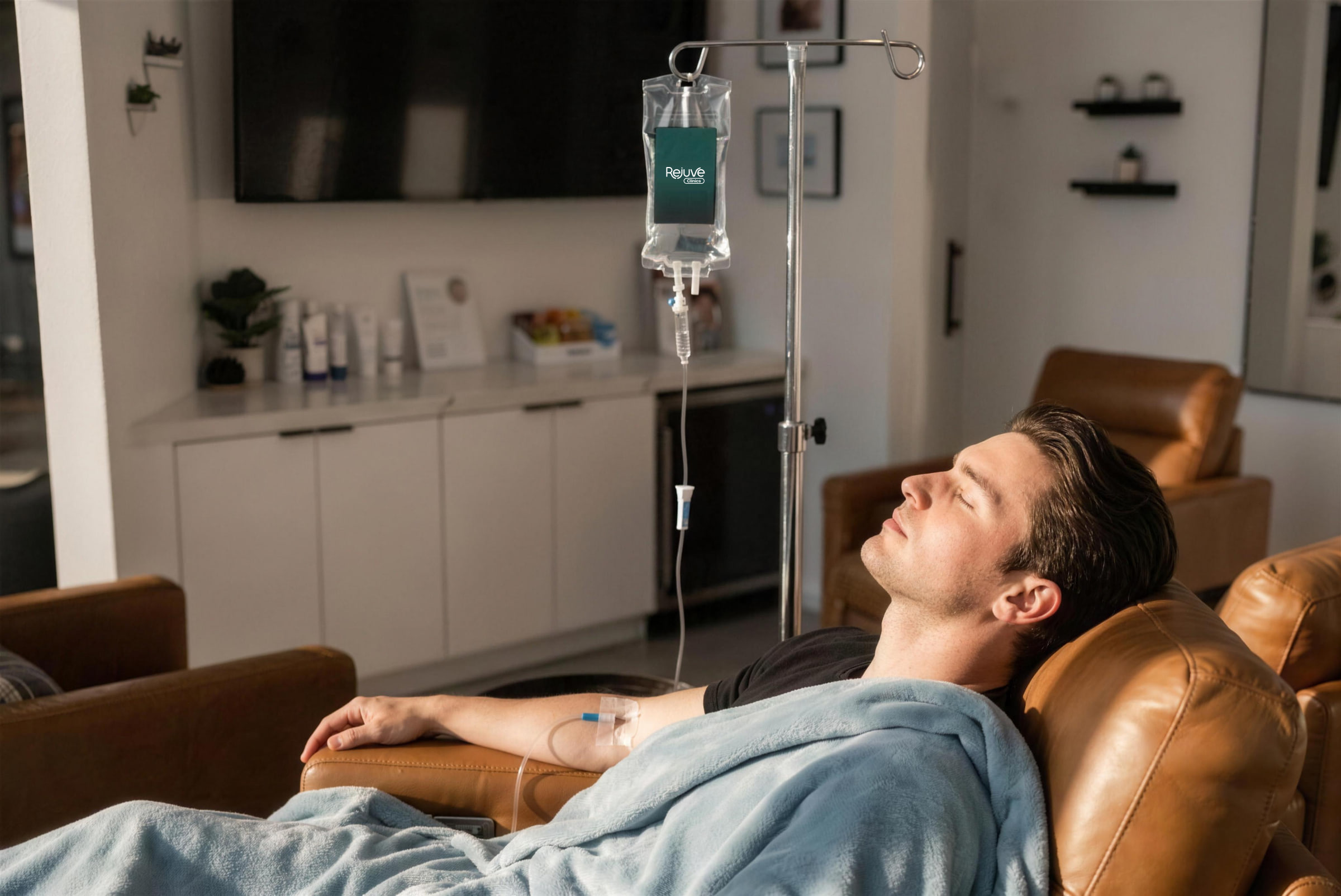 A patient resting in a recliner during a drip at the Sherman Oaks clinic